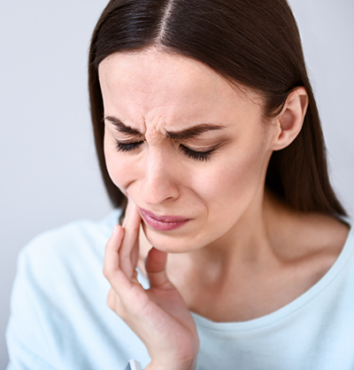 woman with mouth pain